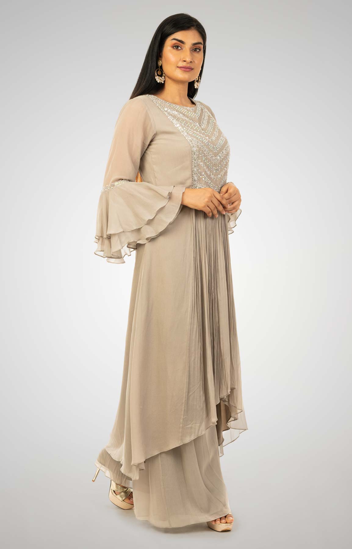 Glided Beige Crepe Palazzo Suit With A-Symmetrical A-line Kurta Adorned With Moti And Bead Work – Viraaya By Ushnakmals